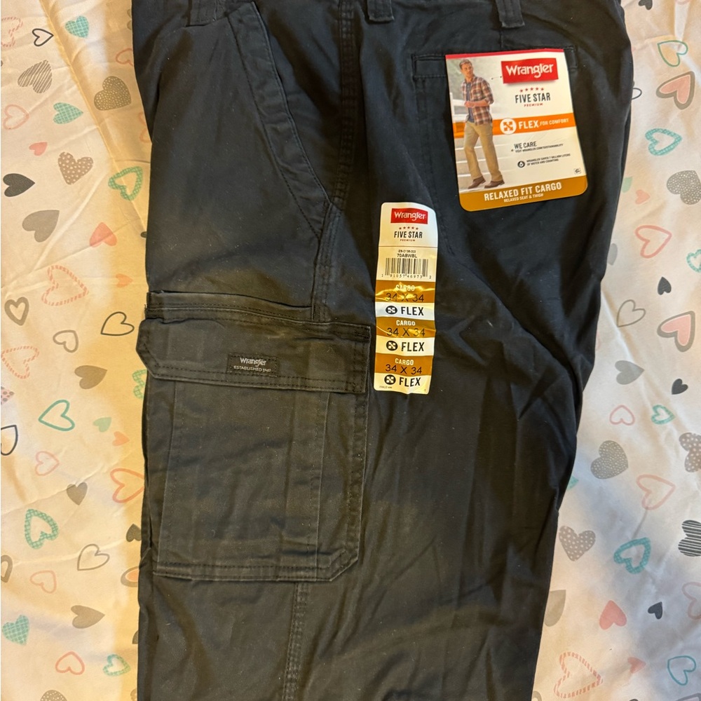 New-2 pairs priced as 1 Black Men’s Cargo Pants
& new w/o tags Dickies tan pants